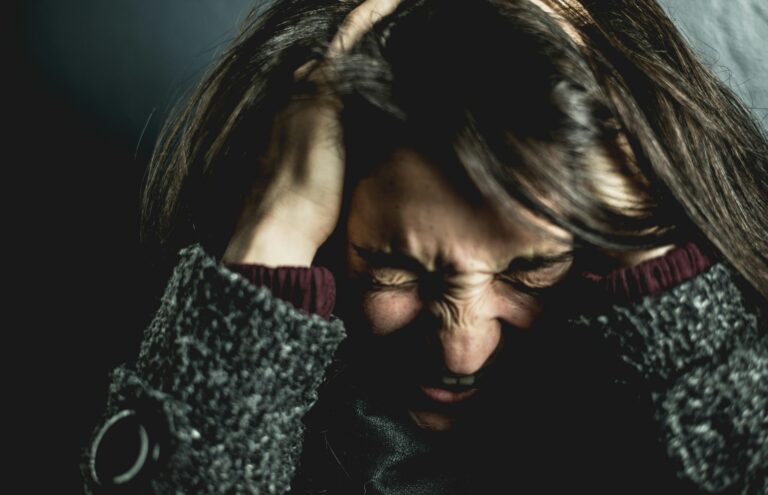 Woman suffering from a headache